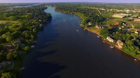 Beautiful Evening Aerial of the Fox River with Speed Boats Stock Footage