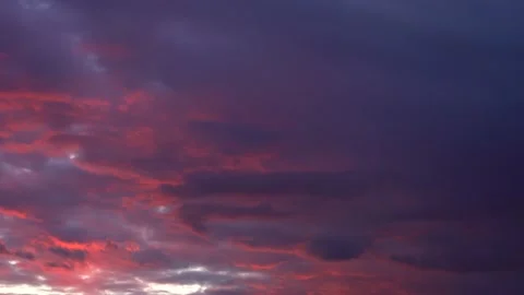      Beautiful evening blue sky at sunset with flaming bright light clouds. A w Stock Footage 163403610