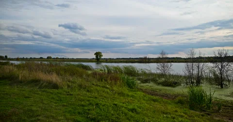Beautiful Evening Cloudscape Scenic Sky Above River. Country Rural Scene Field P Stock Footage 218132046