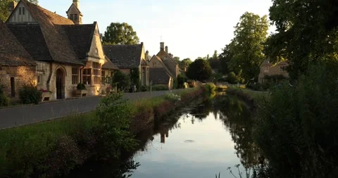Beautiful Evening Light in the village of Lower Slaughter, Cotswolds AONB, UK Stock Footage 346143391