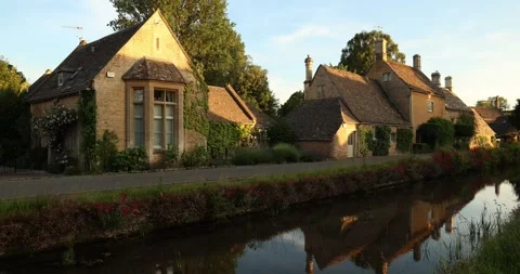 Beautiful Evening Light in the village of Lower Slaughter, Cotswolds AONB, UK Stock Footage 346143577