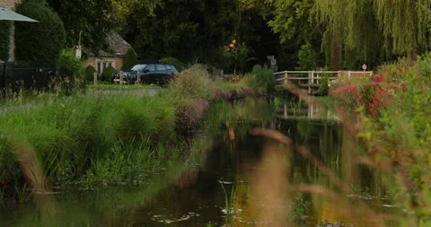 Beautiful Evening Light in the village of Lower Slaughter, Cotswolds AONB, UK Stock Footage 346144471