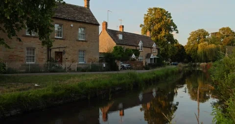 Beautiful Evening Light in the village of Lower Slaughter, Cotswolds AONB, UK Stock Footage 346144479