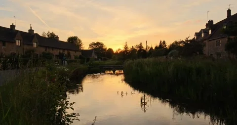 Beautiful Evening Light in the village of Lower Slaughter, Cotswolds AONB, UK Stock Footage 346144858