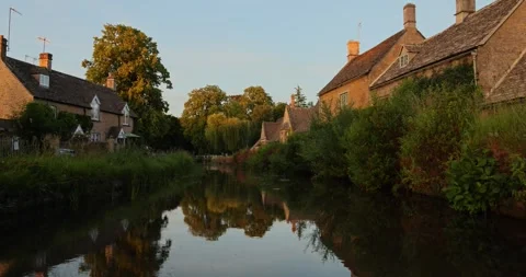 Beautiful Evening Light in the village of Lower Slaughter, Cotswolds AONB, UK Stock Footage 346144902