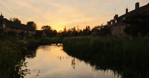 Beautiful Evening Light in the village of Lower Slaughter, Cotswolds AONB, UK Stock Footage 346144982