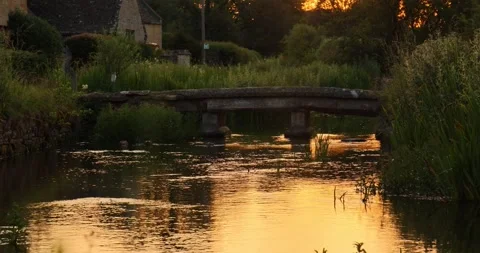 Beautiful Evening Light in the village of Lower Slaughter, Cotswolds AONB, UK Stock Footage 346145072
