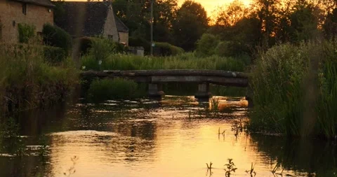 Beautiful Evening Light in the village of Lower Slaughter, Cotswolds AONB, UK Stock Footage 346145171