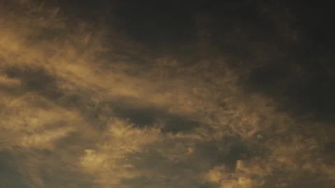 The Beautiful Evening Sky is adorned with Dramatic Clouds that captivate the Stock Footage 318066856