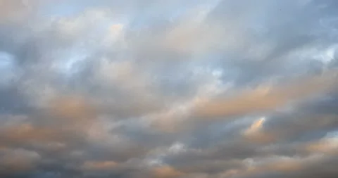 Beautiful evening sky. Evening clouds fast moving away. 4K. Stock Footage 126317595