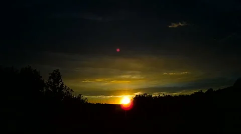 Beautiful evening sky with floating clouds in the sky. Amazing colors of sunset. Stock Footage 66428128