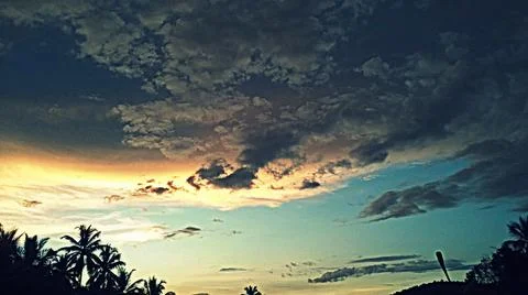 A beautiful evening sky full of clouds Stock Photos