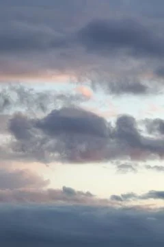 Beautiful evening sky with multi-colored bright clouds Stock Photos