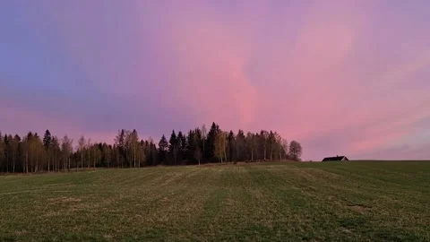 Beautiful evening sky with pink clouds Stock Footage 211884423