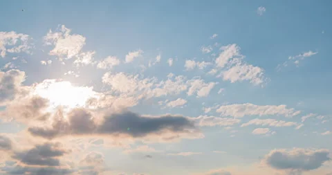 Beautiful evening sky. Sun rays emerge through the clouds at sunset. Stock Footage 252914065