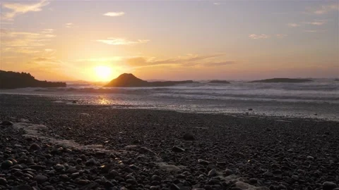 Beautiful evening sunset in empty rocky beach in Morocco nature landscape Stock Footage 233620930