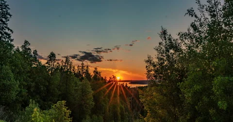 Beautiful evening sunset landscape with a span of time, forest and river in the Stock Footage 112282205