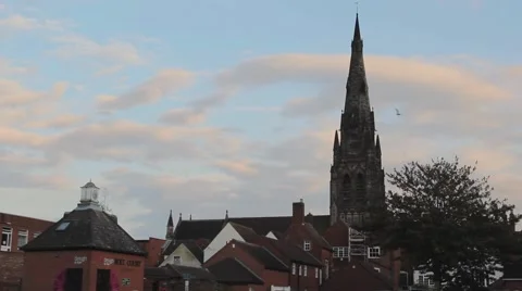 Beautiful Evening Sunset Light on Spire of Church in Historic City Stock-Footage 42528840