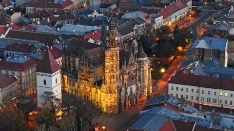 Beautiful evening view of Kosice showcasing illuminated Gothic cathedral Video stock 293690786