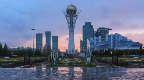 Beautiful evening view with the rainy clouds behind Bayterek in Astana Stock-Footage 55578560