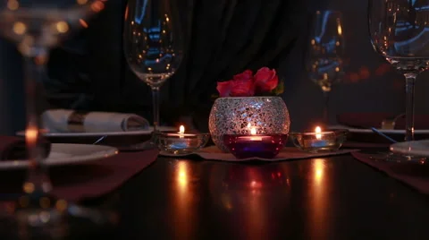 Beautiful expensive table serving for a romantic dinner with candles Stock Footage 48615872