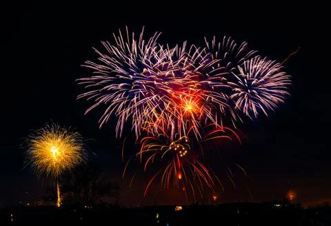 Beautiful exploding fireworks in the night sky in Naples, Italy Stock Photos