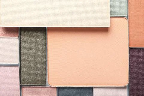 Beautiful eye shadow refill pans as background, top view Stock Photos