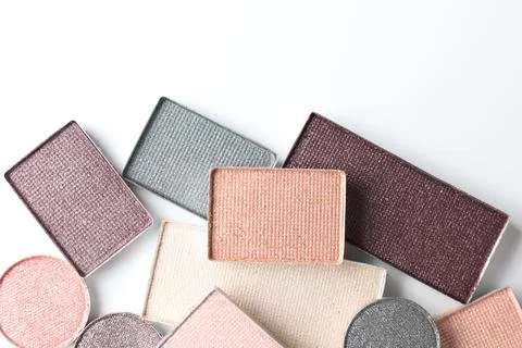 Beautiful eye shadow refill pans on white background, flat lay Stock Photos