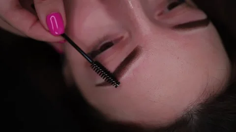 Beautiful eyebrows with permanent makeup Stock Footage 252591905
