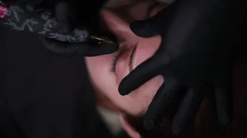 Beautiful eyebrows with permanent makeup Stock Footage 252592226