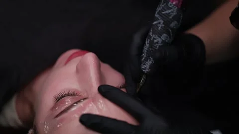 Beautiful eyebrows with permanent makeup Stock Footage 252592247