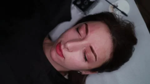 Beautiful eyebrows with permanent makeup Stock Footage 252592407