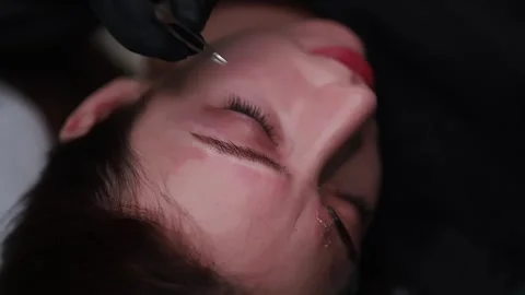 Beautiful eyebrows with permanent makeup Stock Footage 252592535