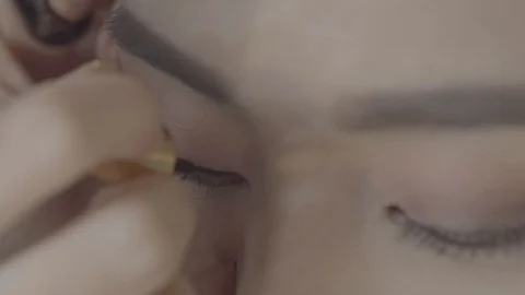 Beautiful Eyes Makeup Tutorial Stock Footage 129803251