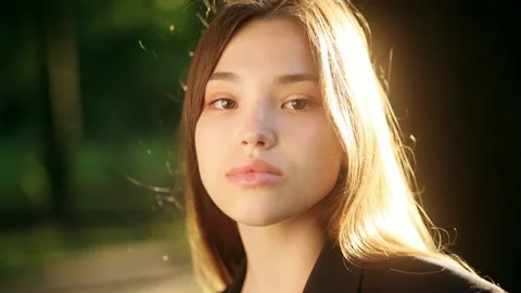 Beautiful face of mixed race young pretty woman with dark hair at sunny day Stock Footage 156891355