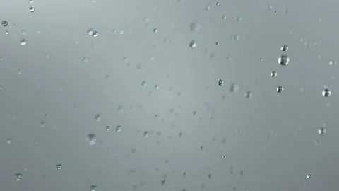 Beautiful falling drops of rain. Video stock 142690896