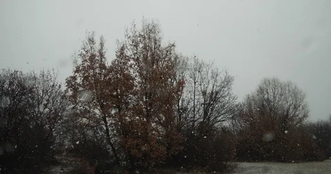 Beautiful falling snow - view from the window_4K Stock Footage 126962953