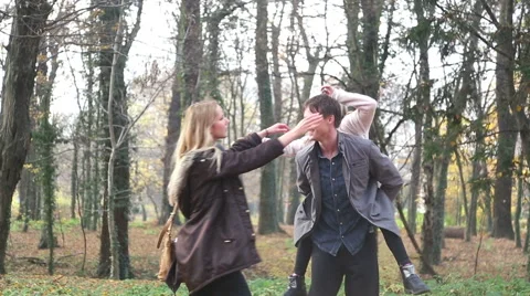 Beautiful family having fun dancing in the park Stock Footage 59553930