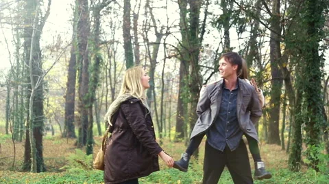 Beautiful family having fun in the park Stock Footage 59553940