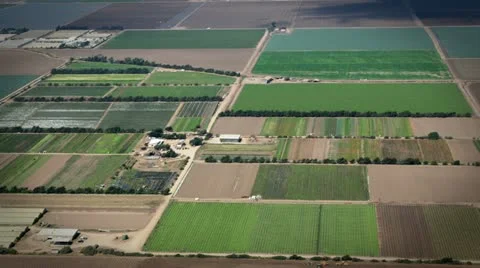Beautiful Farmland flyby aerial shot of huge farms in the Midwest Stock Footage
