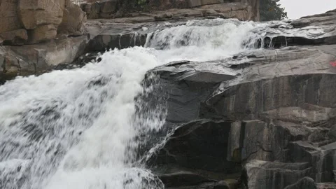 A beautiful fast flowing waterfall. Видео 336946689