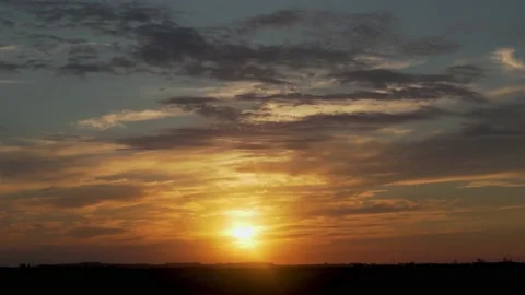 Beautiful Fast Lapse Time of Sunset and Clouds in the Blue Orange Sky. The Sun S Stock Footage 135958261