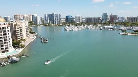 Beautiful fast-moving forward aerial of downtown Sarasota, Florida, and Stock Footage 150821403