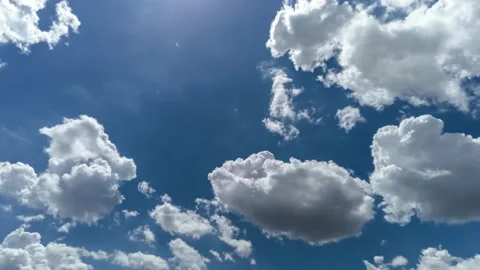 Beautiful fast moving white clouds timelapse Stock Footage 169031467