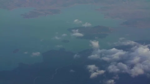 Beautiful fast-sailing clouds on a Sunny day, shooting from aircraft Stock Footage 99452969