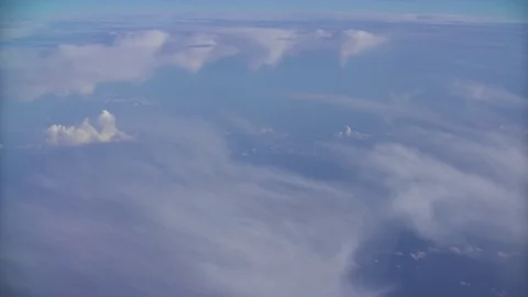 Beautiful fast-sailing clouds on a Sunny day, shooting from aircraft Video stock 99452988
