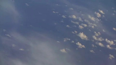 Beautiful fast-sailing clouds on a Sunny day, shooting from aircraft Video stock 99452995
