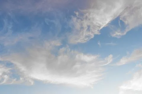 Beautiful feather clouds background in the bright blue sky 스톡 사진
