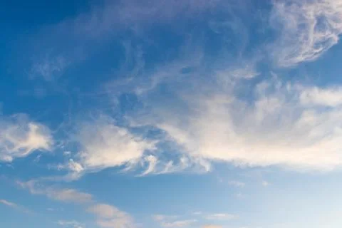 Beautiful feather clouds background in the dark blue sky Stock Photos