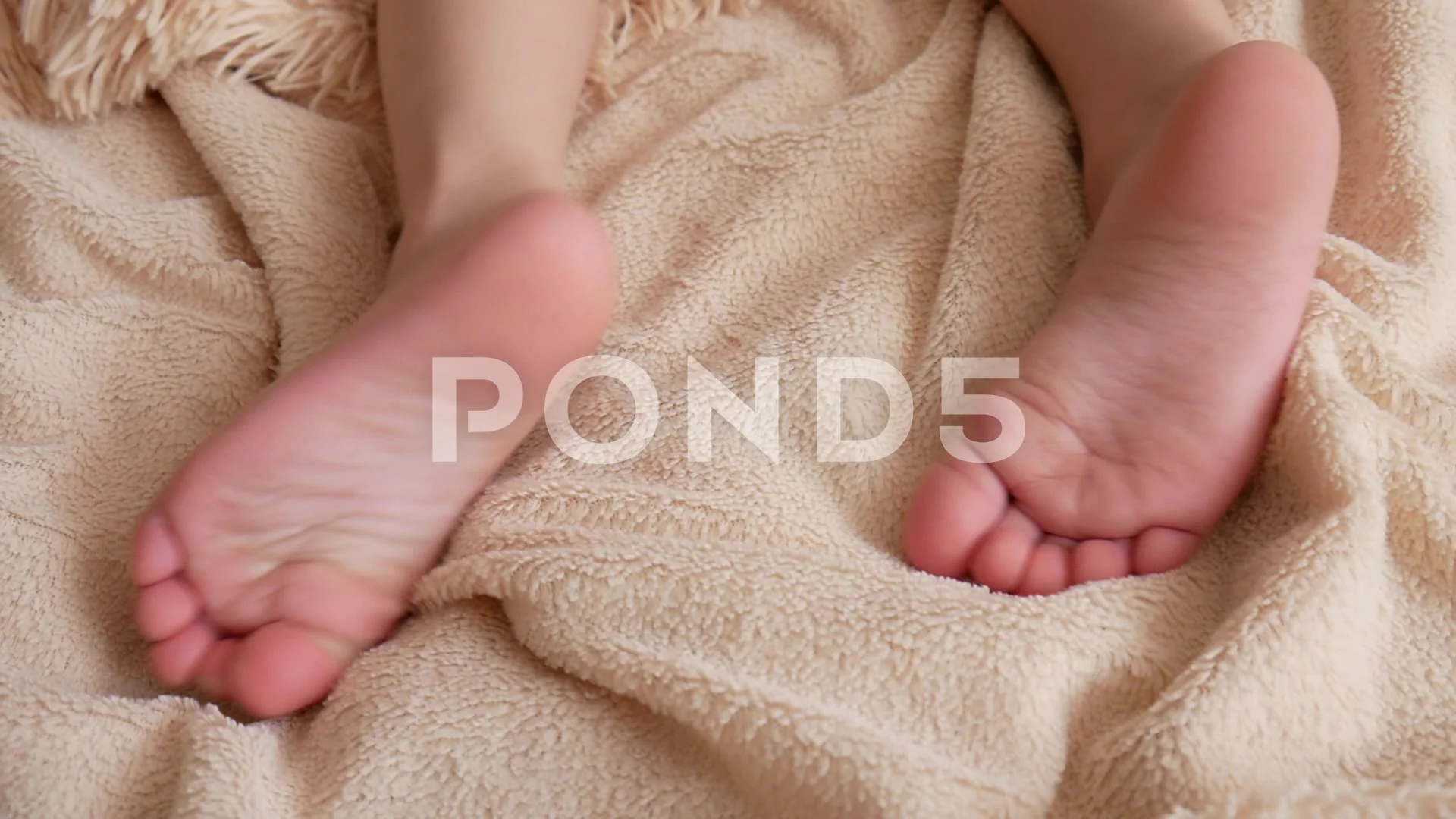 feet little boy Beautiful feet of a little boy lying on ... | Stock Video | Pond5